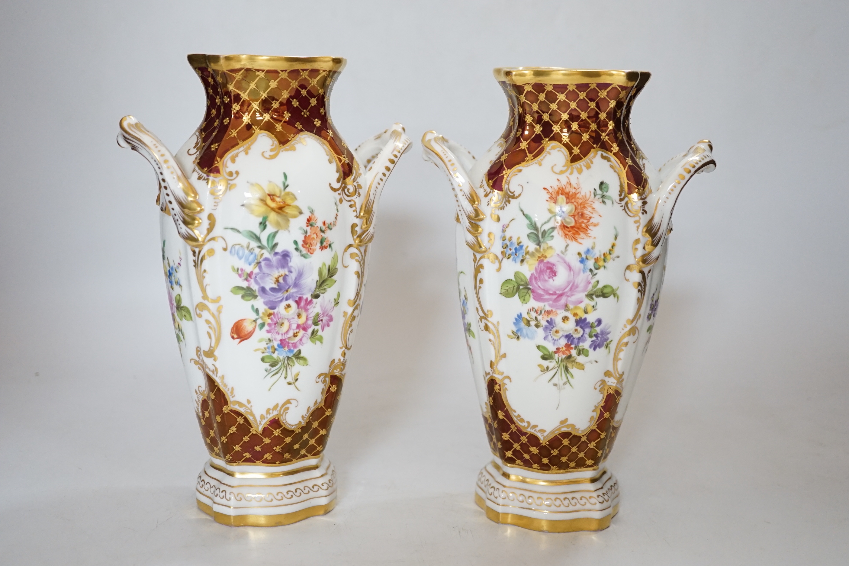 A pair of Potschappel porcelain vases, 20cm